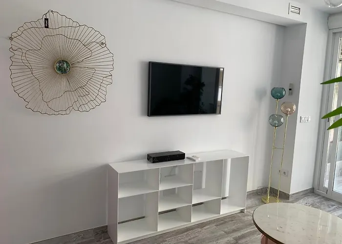 Апартаменты Neptuno Beachfront *